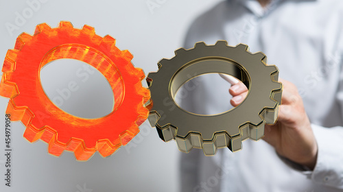 Cyborg hand holding a gear ...