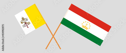 Crossed flags of Vatican and Tajikistan. Official colors. Correct proportion