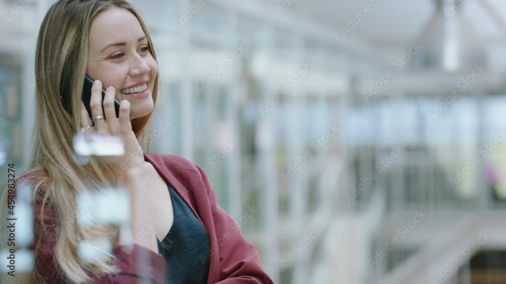 business woman using smartphone having phone call chatting on mobile phone enjoying conversation with client at work in office business woman using smartphone having phone call chatting on mobile phone enjoying conversation with client at work in office
