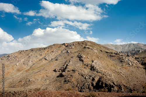 Rocky Mountains with autumnal foliage and cloudy sky  Rocky Mountain khuzestan province  Iran