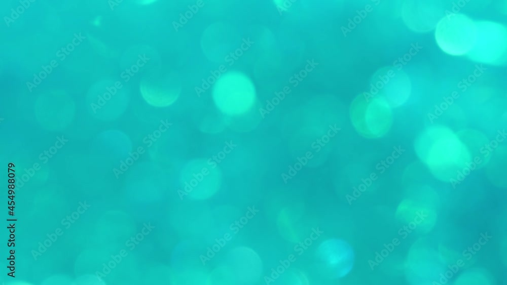 green abstract background of blurred lights with bokeh effect green abstract background of blurred lights with bokeh effect