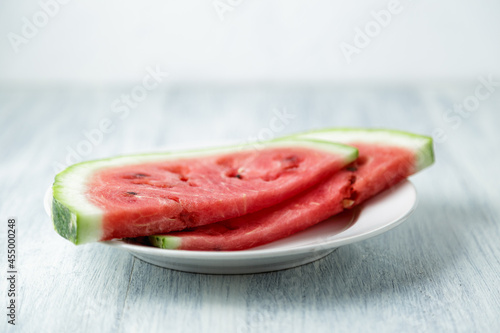 Waterelon  honey watermelon on wooden table background.