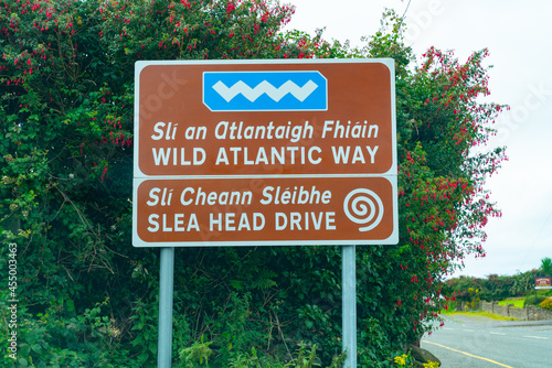 Highway sign for Wild Atlantic Way in two languages, Gaelic and English