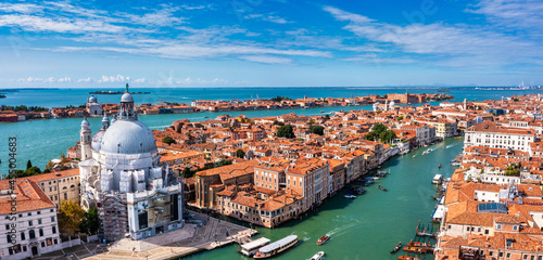 Aerial panoramic cityscape of Venice with Santa Maria della Salute church, Veneto, Italy.