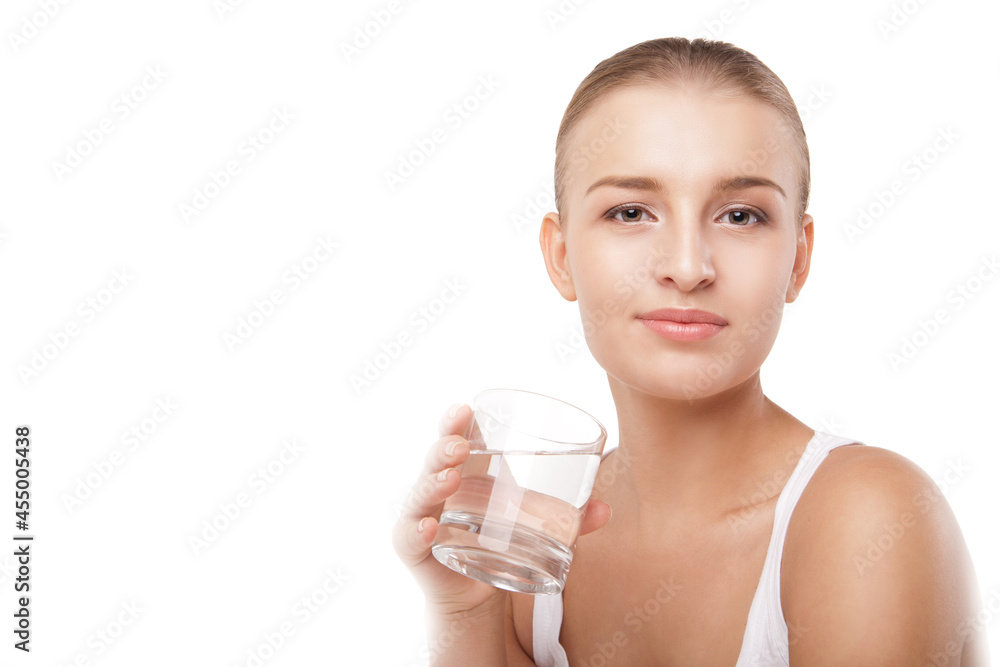 Girl drinking water from glass isolated Girl drinking water from glass isolated