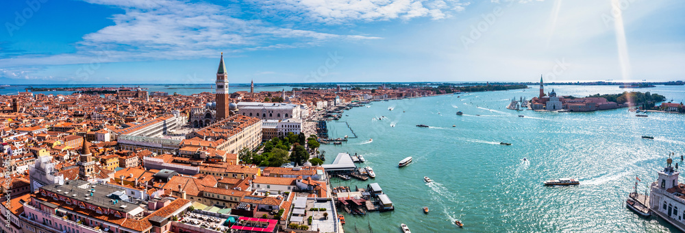 Aerial panoramic view of iconic and unique Campanile in Saint Mark's square or Piazza San Marco, Venice, Italy