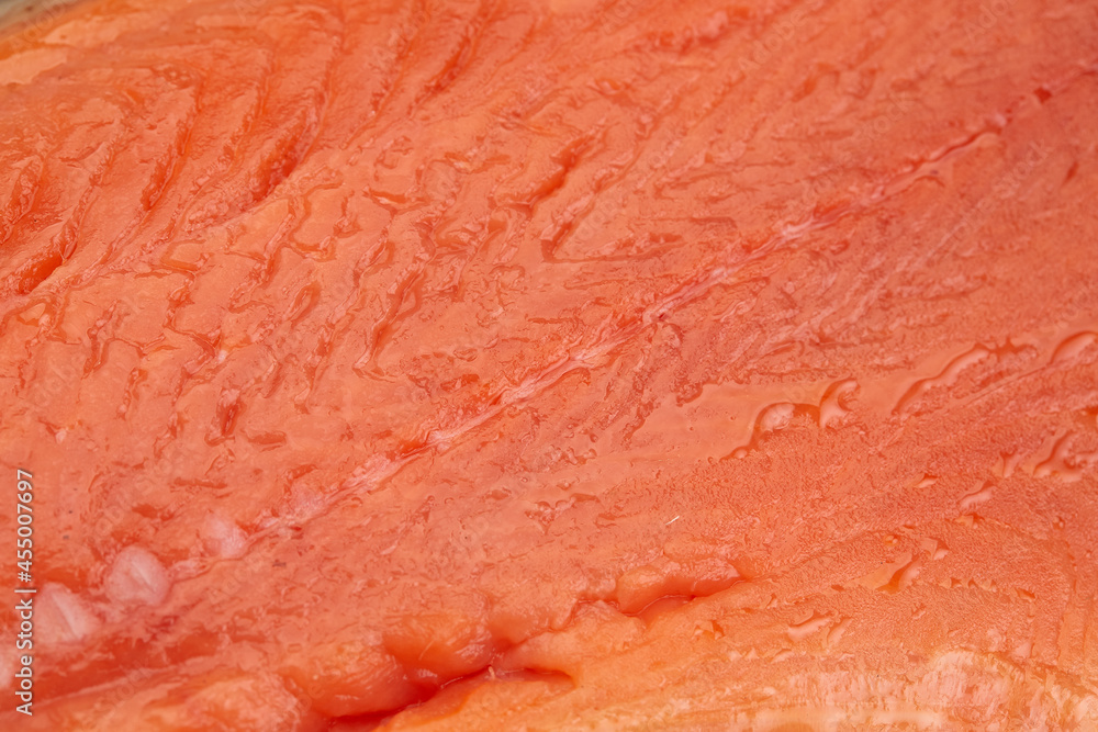 Red fish fillet meat close-up. Trout or salmon, texture and macro photo. Content for an online store or advertising. Seafood close up Red fish fillet meat close-up. Trout or salmon, texture and macro photo. Content for an online store or advertising. Seafood close up