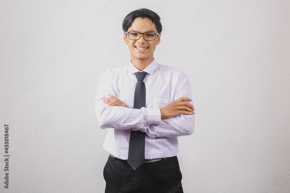 Portrait of a confident businessman smiling with arms crossed Portrait of a confident businessman smiling with arms crossed