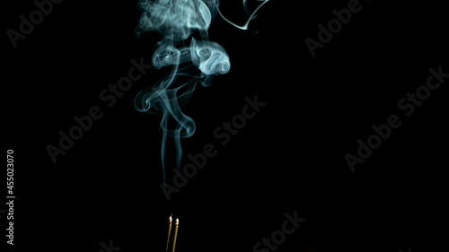 Sticks Smoke in Night