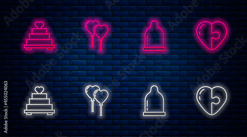 Set line Balloons in form of heart, Condom, Wedding cake with and Heart. Glowing neon icon on brick wall. Vector