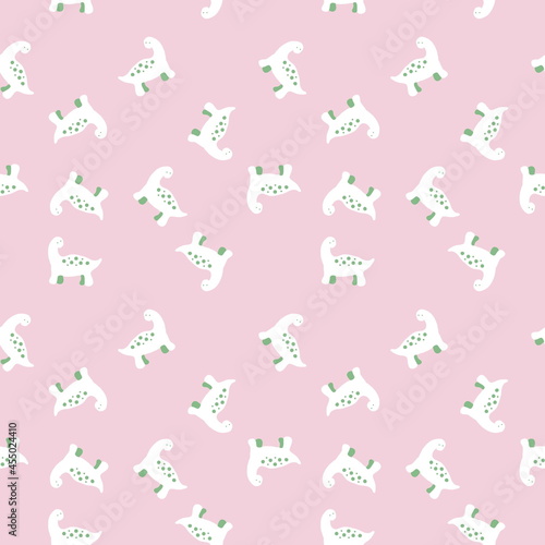 Fototapeta Naklejka Na Ścianę i Meble -  Pastel colored seamless pattern of spotted dinosaurs. Perfect for T-shirt, textile and prints. Hand drawn illustration for decor and design.
