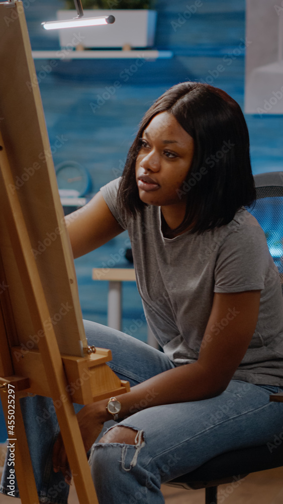 African american artist analyzing white vase design for drawing project. Black young woman using authentic inspiration on canvas to draw beautiful masterpiece and fine art concept