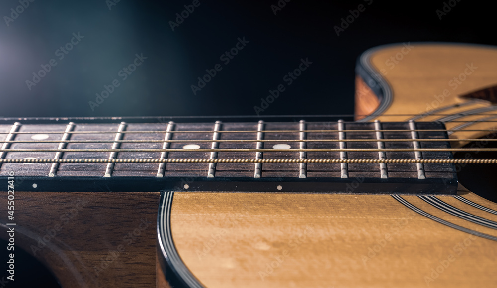 Fototapeta premium Close-up of a body part of an acoustic guitar.