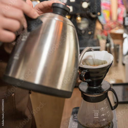 Barista makes filtred coffee  .  Coffee making process. photo