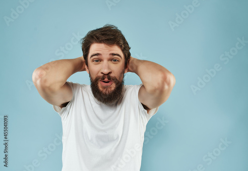 bearded man in a white t-shirt happy facial expression Studio
