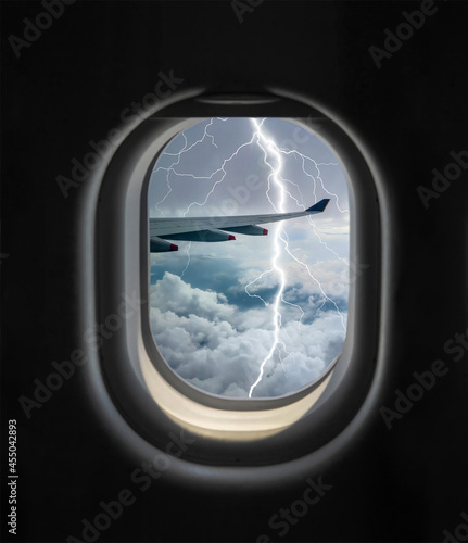 Plane is flying through the storm.Aircraft lightning. The plane was hit by lightning.