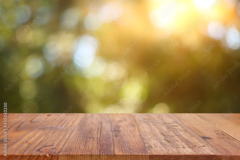 Empty rustic table in front of countryside background. product display and picnic concept Empty rustic table in front of countryside background. product display and picnic concept