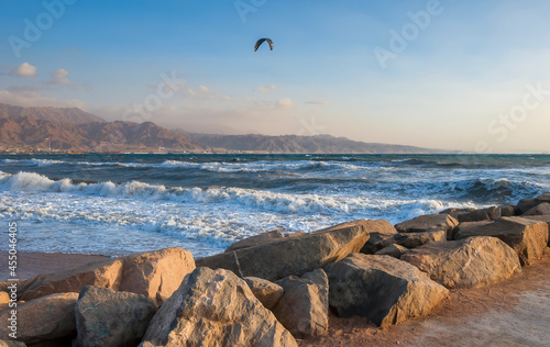 Stormy waves on the beach and water sport and kite surfing, Red Sea