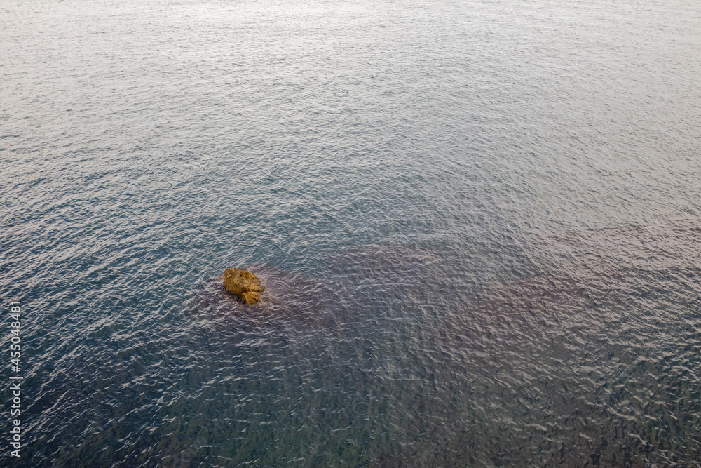 Stranded with rocks on the coastal sea. Minimalistic photography. Stranded with rocks on the coastal sea. Minimalistic photography.