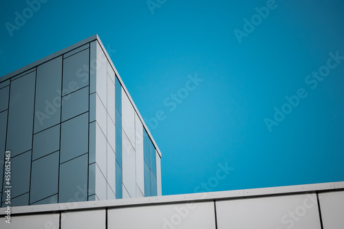 glass and steel business center building against the sky