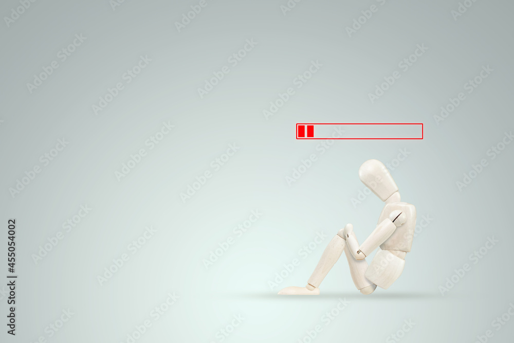 The puppet puppet has run out of energy, the battery is discharged. The concept of fatigue, emotional burnout, laziness, poor employee, procrastination. The puppet puppet has run out of energy, the battery is discharged. The concept of fatigue, emotional burnout, laziness, poor employee, procrastination.