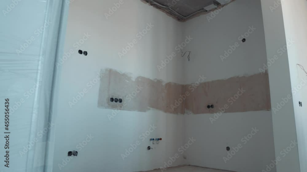Vidéo Stock White Wall with Circular Electrical Outlets Junction Boxes
