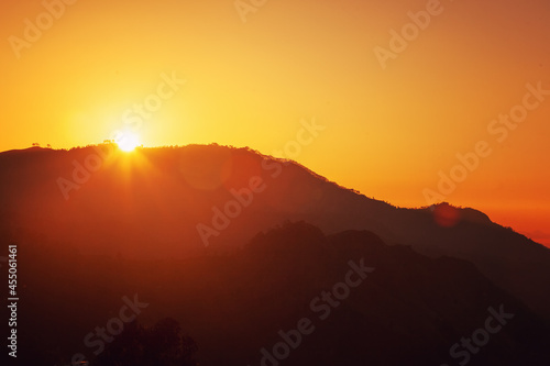 Mountain valley during bright sunrise. Beautiful natural landscape. Perfect sunset