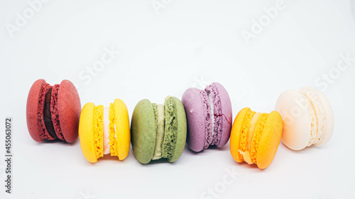 pastel colored macarons isolated on white background.