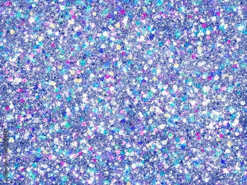 オーロラカラーのブルーラメを敷き詰めた背景　質感素材