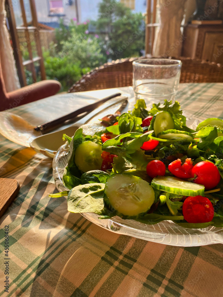 A plate of salad on a table A plate of salad on a table