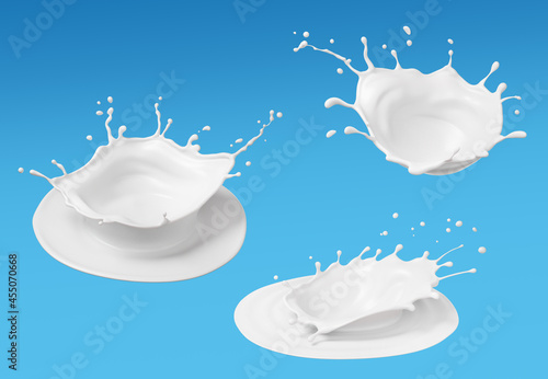 set of milk splashes isolated on blue background