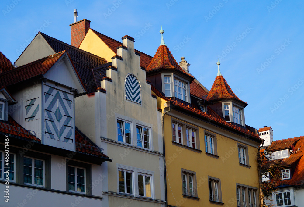 Beautiful and quaint German houses on Island of Lindau against the blue sky
