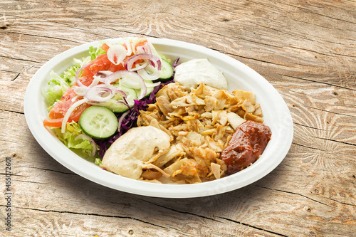 Delicious chicken doner kebab grilled meat with mixed vegetables.