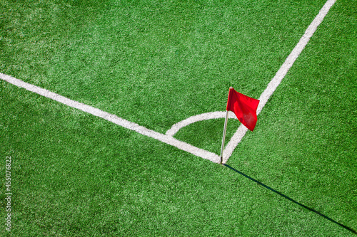 Football or soccer field. Corner flag green background photo