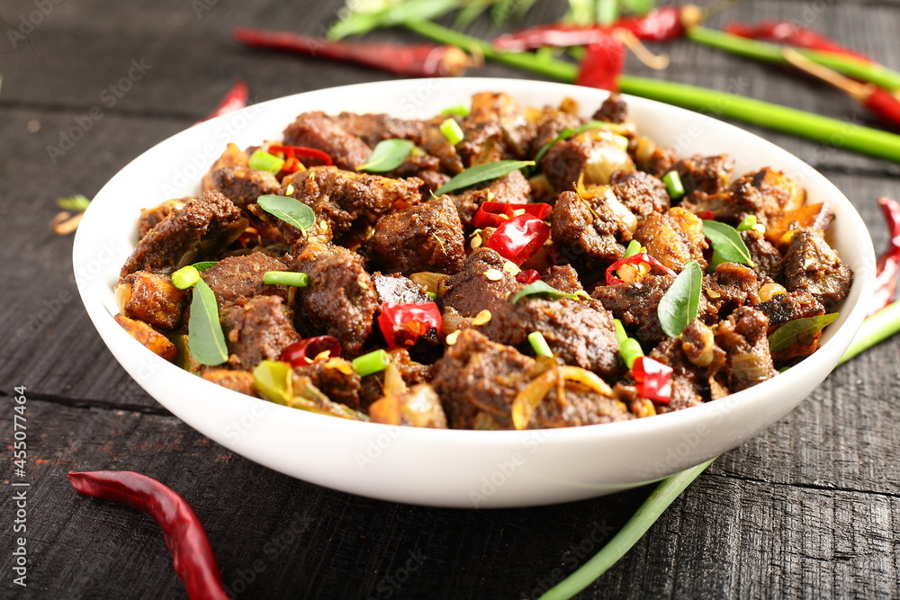 Delicious mutton meat fry with exotic Indian spices. Delicious mutton meat fry with exotic Indian spices.