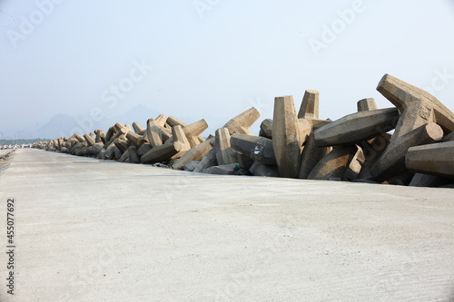 Sea wall on the harbor for protecting sand erosion, 