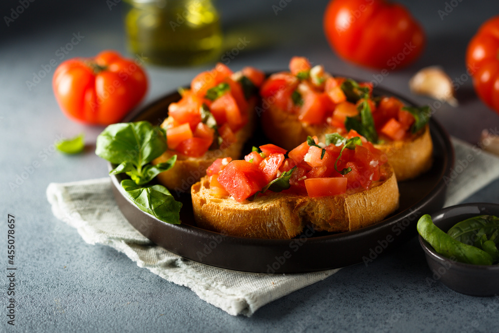 Traditional homemade bruschetta with tomato and basil