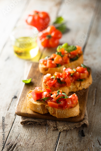 Traditional homemade bruschetta with tomato and basil