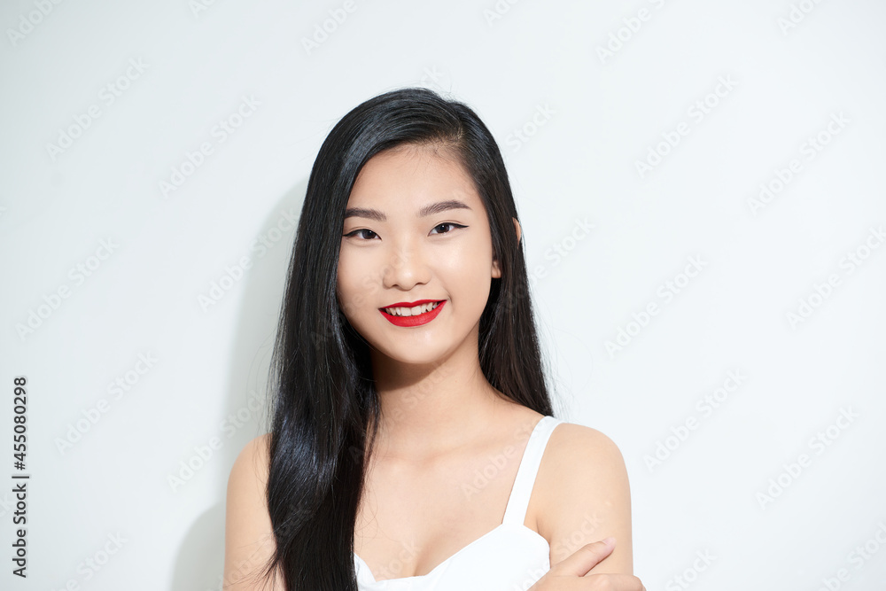 Beautiful face of young adult woman with clean fresh skin - isolated on white Beautiful face of young adult woman with clean fresh skin - isolated on white