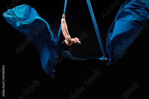 A female gymnast on an gymnastic canvases