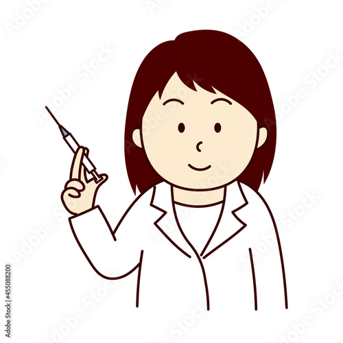 ワクチン注射を手に持つ若い女性医師