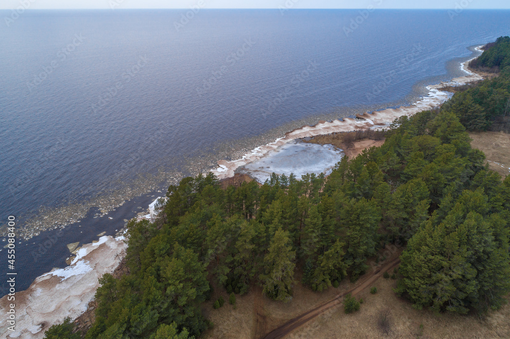 The coast of Ladoga lake Ladoga on March afternoon (shooting from a quadrocopter). Leningrad region, Russia