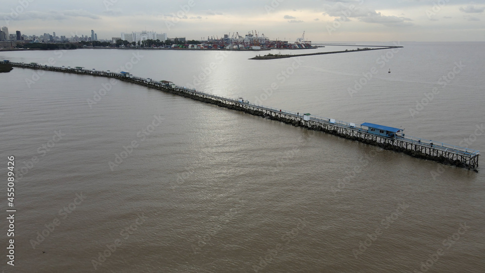 Aerial shot of pier and port next to skyline of Buenos Aires during cloudy day,Argentina