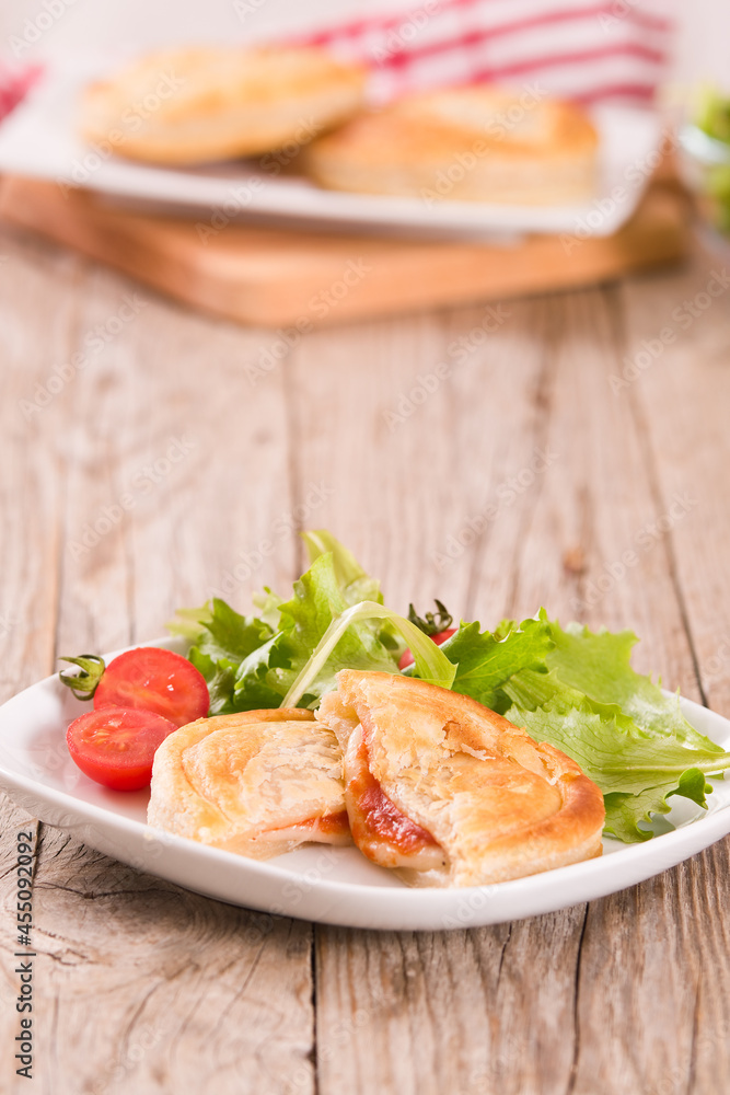 Puff pastry filled with tomato and mozzarella cheese. Puff pastry filled with tomato and mozzarella cheese.