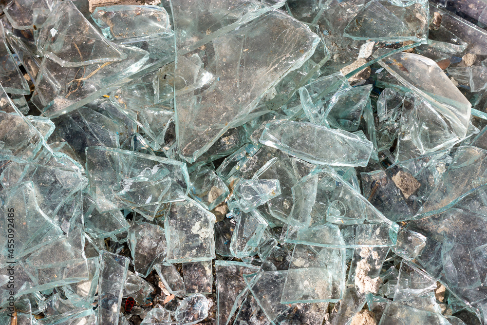 Broken glass. Pieces of broken glass. Sharp glass. Broken glass. Pieces of broken glass. Sharp glass.