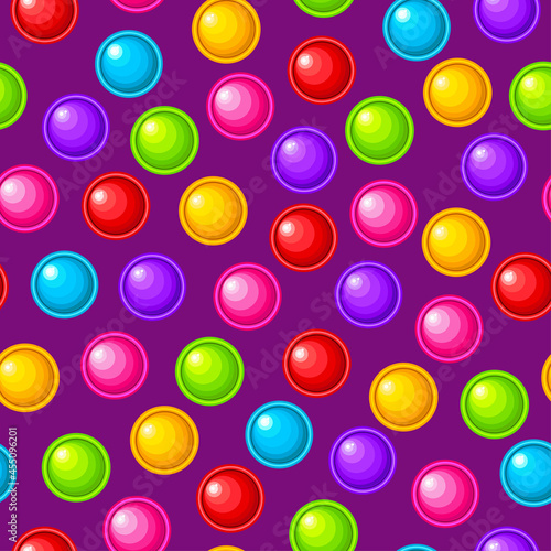 Seamless pattern, toy balls. Colorful sensory anti-stress toy for fidget pop it. Colorful silicone bubbles. A fashionable toy with a simple dimple of rainbow color on a purple background.