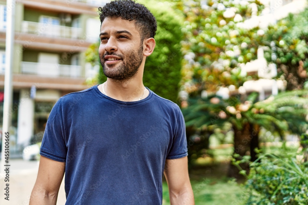Young arab man smiling confident on a sunny day at the street Young arab man smiling confident on a sunny day at the street