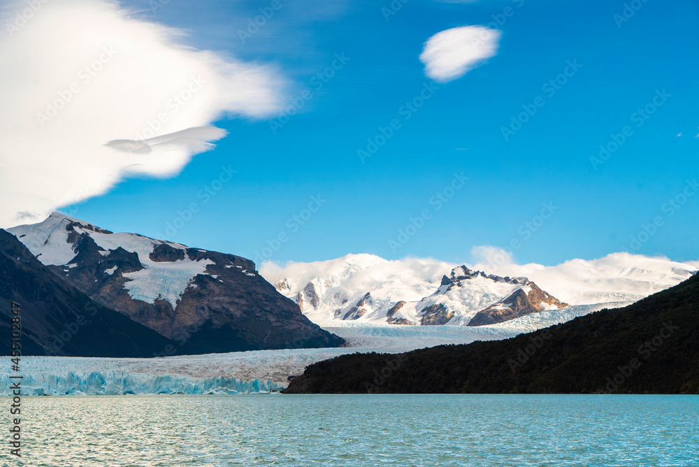 Perito Moreno Glacier, Santa Cruz, Argentina. A beautiful day with some clouds in the sky