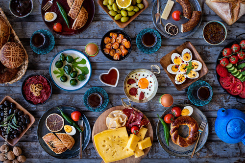 Breakfast table with many kinds of food