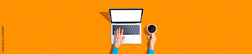 Person using a laptop computer Person using a laptop computer